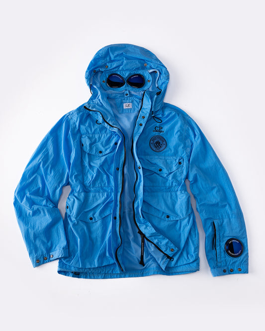 Man City and C.P. Company Collaboration: Iconic Goggle Jackets Make a Stylish Comeback