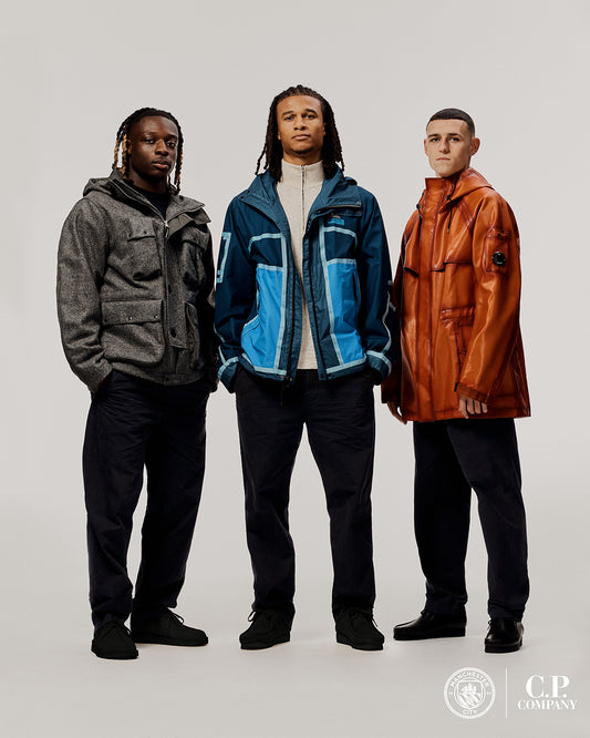 Phil Foden, Nathan Aké, and Jérémy Doku Front C.P. Company's FW024 Collection