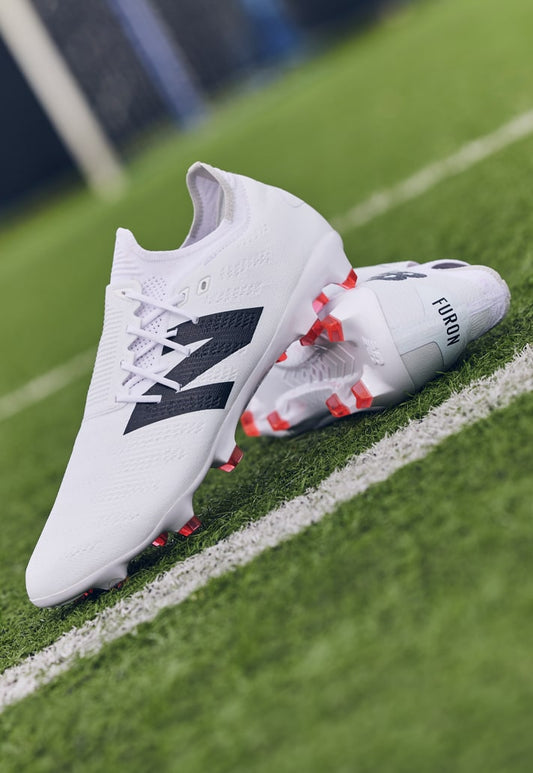Unveil the Power of Choice with New Balance's Latest Football Boots Collection: Embrace the Whiteout and Blackout